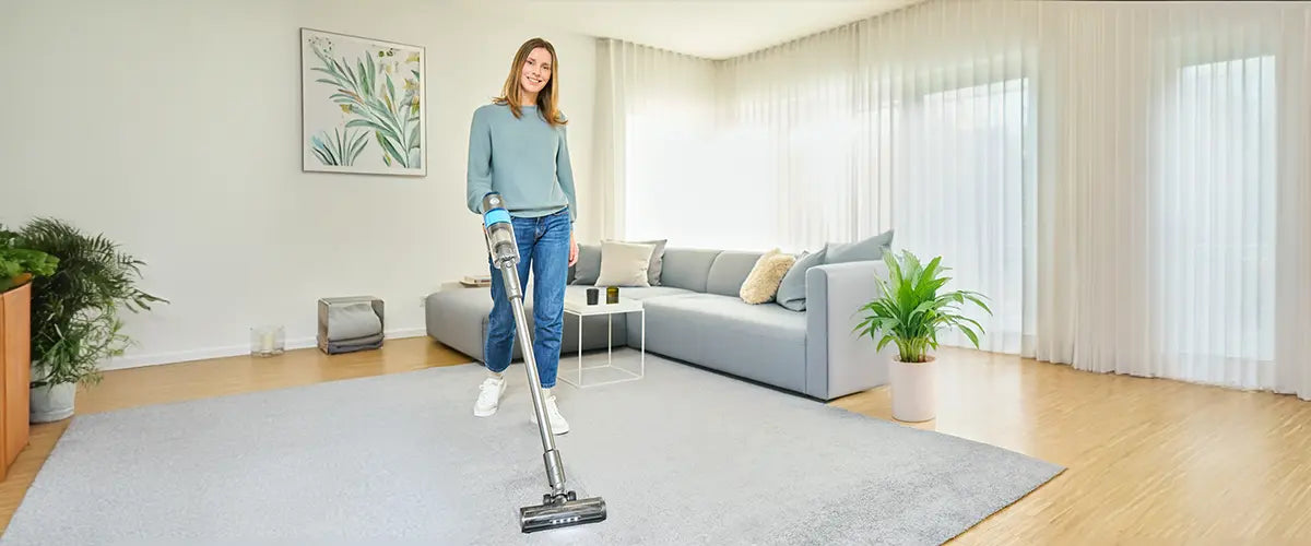 SEBO Balance A1 cordless vacuum in use in a living room